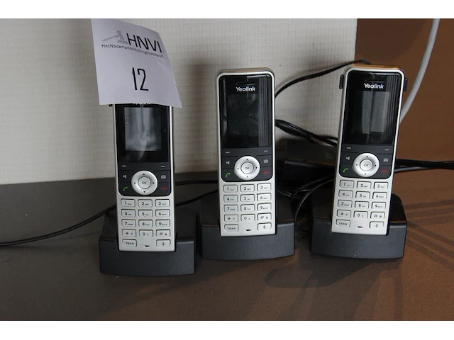 Drie handheld telefoons yealink - afbeelding 1 van  1