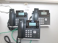 Drie telefoontoestellen yealink ultra-elegant gigabit ip phone sip-t48g. - afbeelding 1 van  2