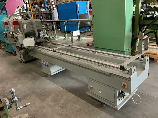 Dubbelkop verstek afkortcirkelzaagmachine - afbeelding 1 van  15