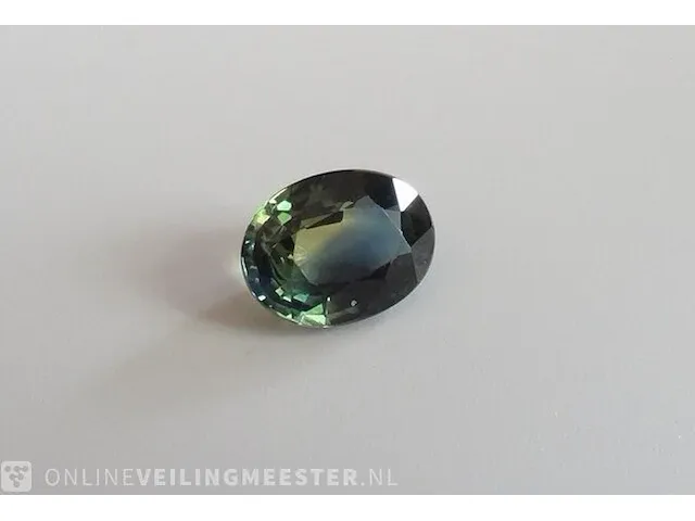 Edelsteen, 1.56 ct oval yellow-green-blue sapphire. - afbeelding 4 van  15