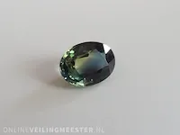 Edelsteen, 1.56 ct oval yellow-green-blue sapphire. - afbeelding 4 van  15