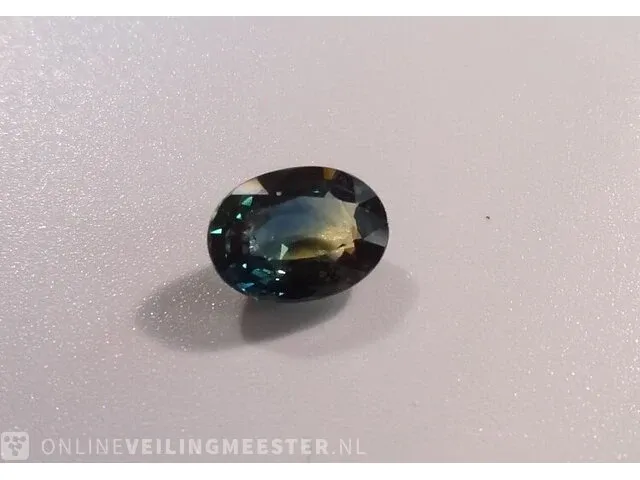 Edelsteen, 1.56 ct oval yellow-green-blue sapphire. - afbeelding 9 van  15