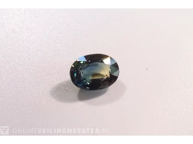 Edelsteen, 1.56 ct oval yellow-green-blue sapphire. - afbeelding 11 van  15