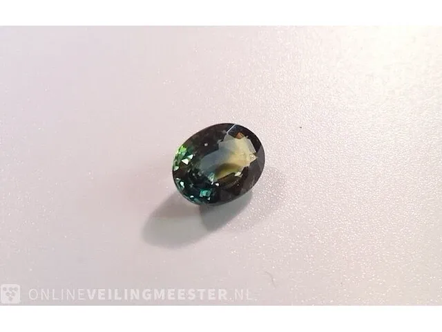Edelsteen, 1.56 ct oval yellow-green-blue sapphire. - afbeelding 12 van  15