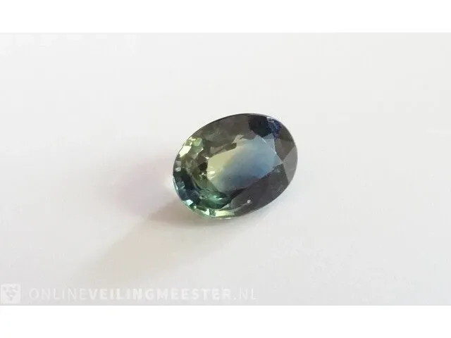 Edelsteen, 1.56 ct oval yellow-green-blue sapphire. - afbeelding 15 van  15