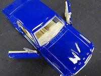 Ford mustang (1964) blauw - afbeelding 5 van  5