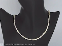 Geelgouden tenniscollier met 14.77 carat briljant geslepen diamant