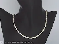 Geelgouden tenniscollier met 14.77 carat briljant geslepen diamant