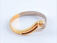 Getaxeerde gouden ring - afbeelding 4 van  10