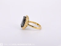 Gold entourage ring with large diamonds and a black diamond - afbeelding 7 van  8