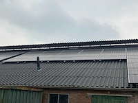 Golfplaat dak geïsoleerd met 940 mono zonnepanelen 310wp en 6x huawei omvormer - afbeelding 11 van  34