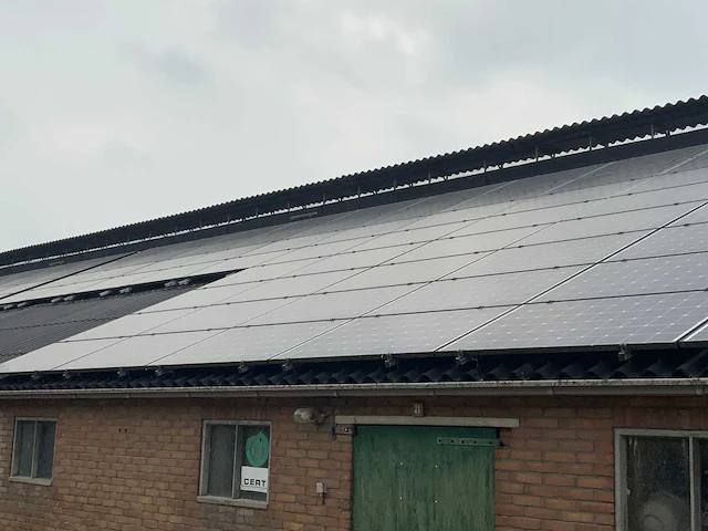 Golfplaat dak geïsoleerd met 940 mono zonnepanelen 310wp en 6x huawei omvormer - afbeelding 15 van  34