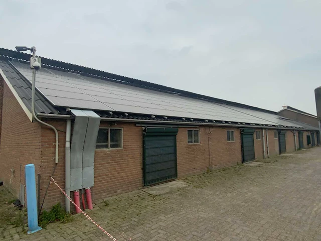 Golfplaat dak geïsoleerd met 940 mono zonnepanelen 310wp en 6x huawei omvormer - afbeelding 12 van  34