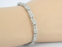 Gouden armband met briljant en baguette geslepen diamanten - afbeelding 3 van  10