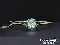 Gouden armband met diamanten en smaragden