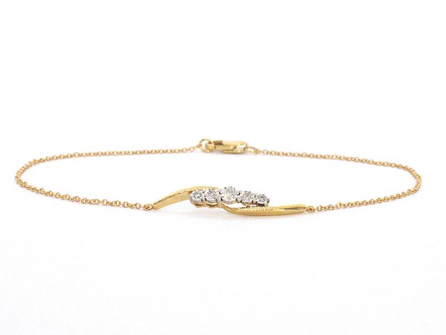 Gouden armband met diamanten in een rij gezet - afbeelding 1 van  10