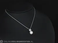 Gouden collier met diamanten en een parel - afbeelding 1 van  7