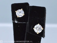 Gouden diamanten oorbellen van 0.60 carat - afbeelding 1 van  4