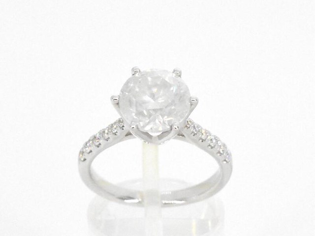 Gouden diamanten solitair ring met een grote diamant van 3.00 carat en kleine diamanten - afbeelding 1 van  12