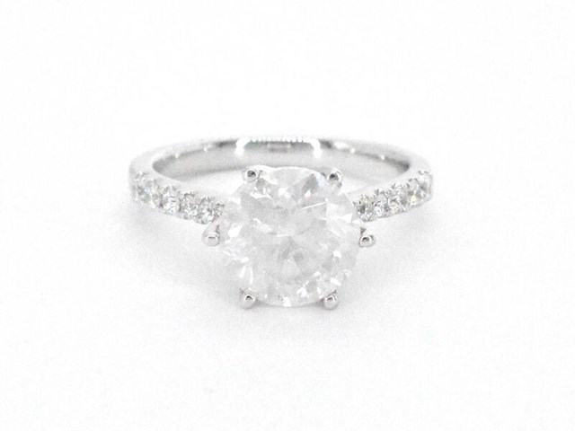 Gouden diamanten solitair ring met een grote diamant van 3.00 carat en kleine diamanten - afbeelding 9 van  12