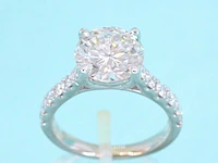Gouden diamanten solitair ring met een grote diamant van 3.00 carat