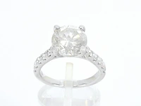 Gouden diamanten solitair ring met een grote diamant van 4.00 carat en kleine diamanten - afbeelding 1 van  9
