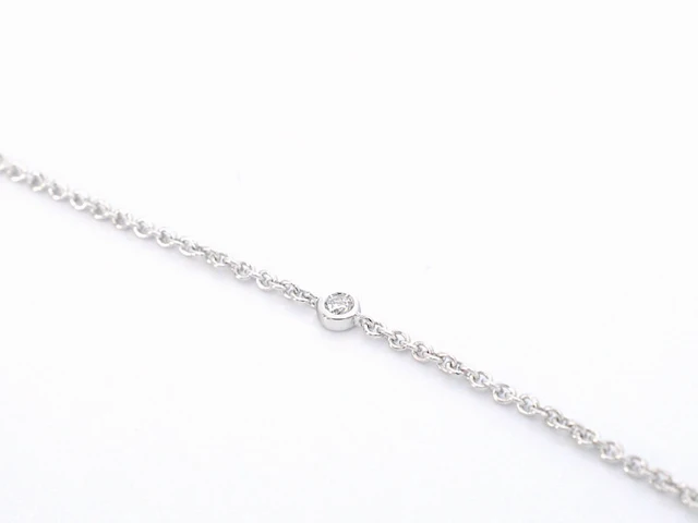 Gouden druppelvormige hanger en collier vol met diamanten - afbeelding 9 van  11