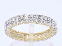 Gouden eternity ring met diamanten - afbeelding 1 van  11