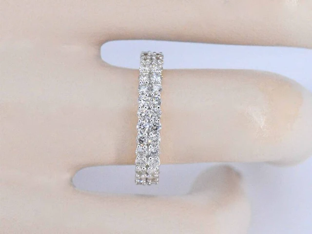Gouden eternity ring met diamanten - afbeelding 4 van  11