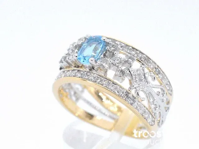 Gouden exclusieve ring vol met diamanten en een edelsteen - afbeelding 3 van  9