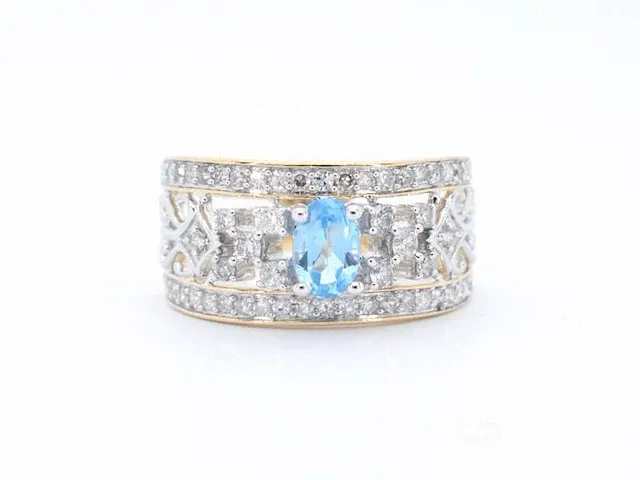 Gouden exclusieve ring vol met diamanten en een edelsteen - afbeelding 6 van  9