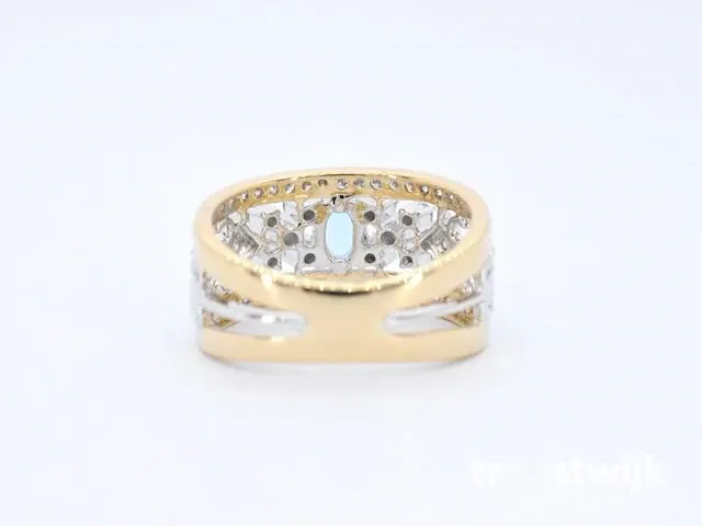 Gouden exclusieve ring vol met diamanten en een edelsteen - afbeelding 7 van  9