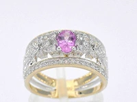 Gouden exclusieve ring vol met diamanten en een edelsteen - afbeelding 1 van  11