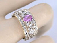 Gouden exclusieve ring vol met diamanten en een edelsteen - afbeelding 4 van  11