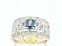 Gouden exclusieve ring vol met diamanten en een edelsteen - afbeelding 1 van  11