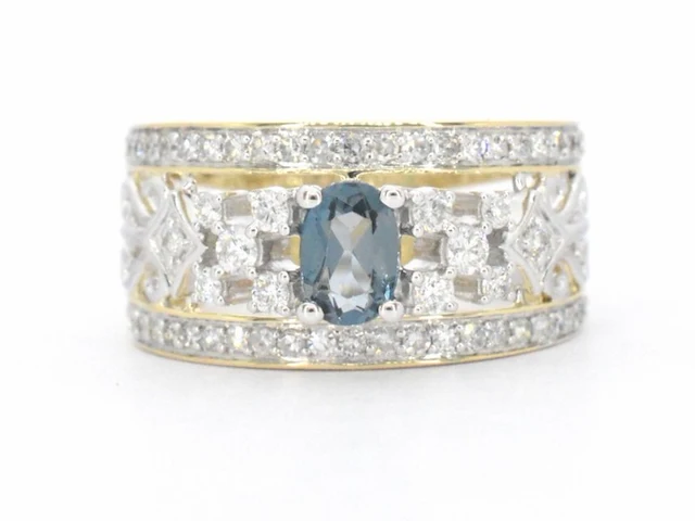 Gouden exclusieve ring vol met diamanten en een edelsteen - afbeelding 8 van  11