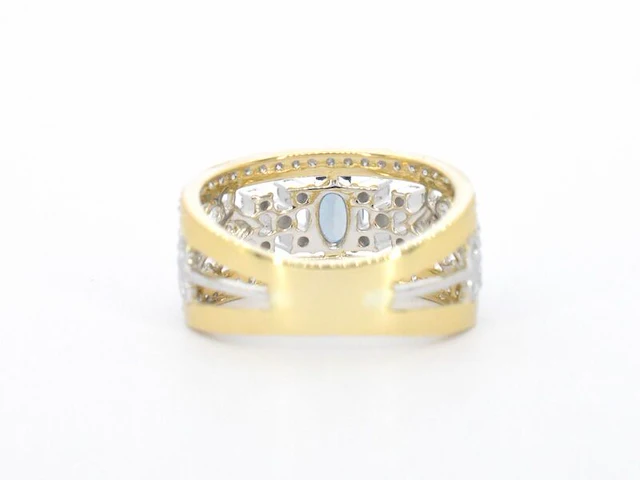 Gouden exclusieve ring vol met diamanten en een edelsteen - afbeelding 9 van  11