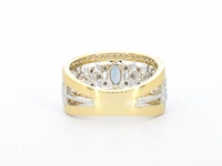 Gouden exclusieve ring vol met diamanten en een edelsteen - afbeelding 9 van  11
