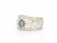 Gouden exclusieve ring vol met diamanten en een edelsteen - afbeelding 10 van  11