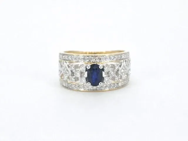 Gouden exclusieve ring vol met diamanten en een saffier - afbeelding 7 van  10