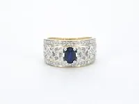 Gouden exclusieve ring vol met diamanten en een saffier - afbeelding 7 van  10