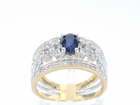 Gouden exclusieve ring vol met diamanten en een saffier - afbeelding 1 van  11