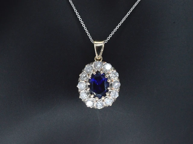 Gouden hanger met een blauwe edelsteen en natuurlijke witte diamanten , excl. ketting - afbeelding 1 van  9