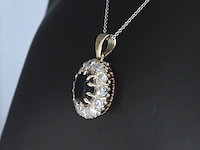 Gouden hanger met een blauwe edelsteen en natuurlijke witte diamanten , excl. ketting - afbeelding 4 van  9