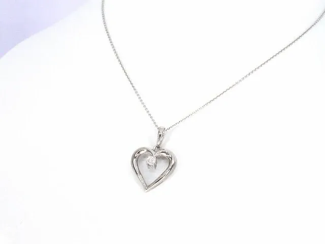 Gouden hart hanger met een diamant - afbeelding 5 van  9