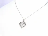 Gouden hart hanger met een diamant - afbeelding 5 van  9
