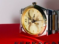 Gouden heren horloge - ferragamo vega met 16 diamanten van €1500,00