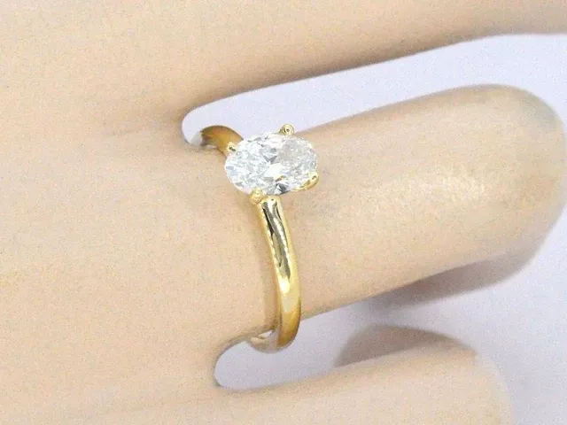 Gouden ovaal solitair ring met een 1.00 carat diamant - afbeelding 10 van  10