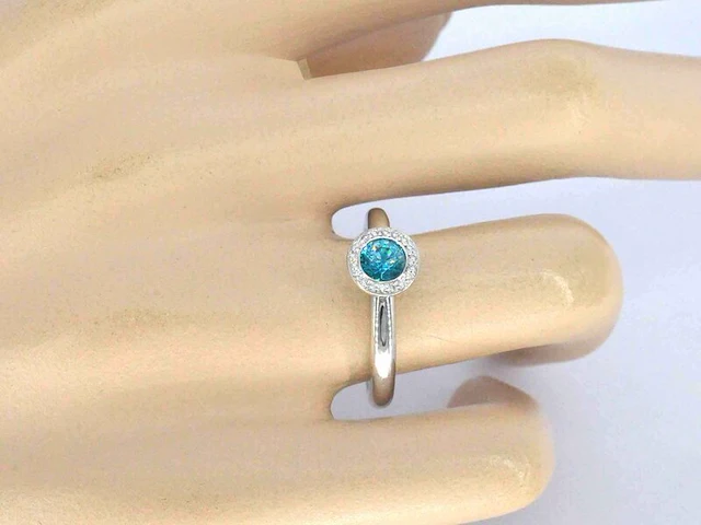 Gouden ring met natuurlijke diamanten en een swiss blue topaas - afbeelding 2 van  10