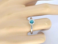 Gouden ring met natuurlijke diamanten en een swiss blue topaas - afbeelding 2 van  10